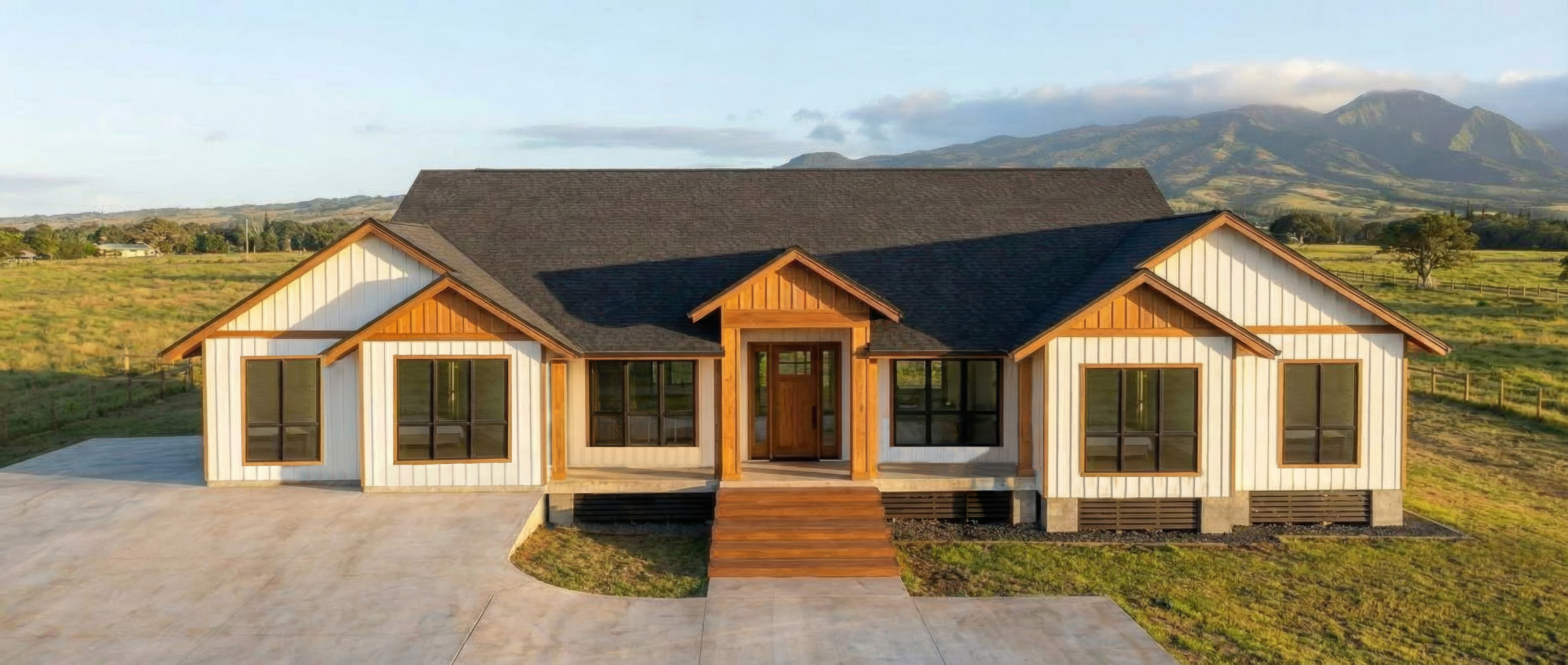 Kapahi Residence on Kauaʻi with rural residential architecture, restrained materials, and a strong relationship to the landscape