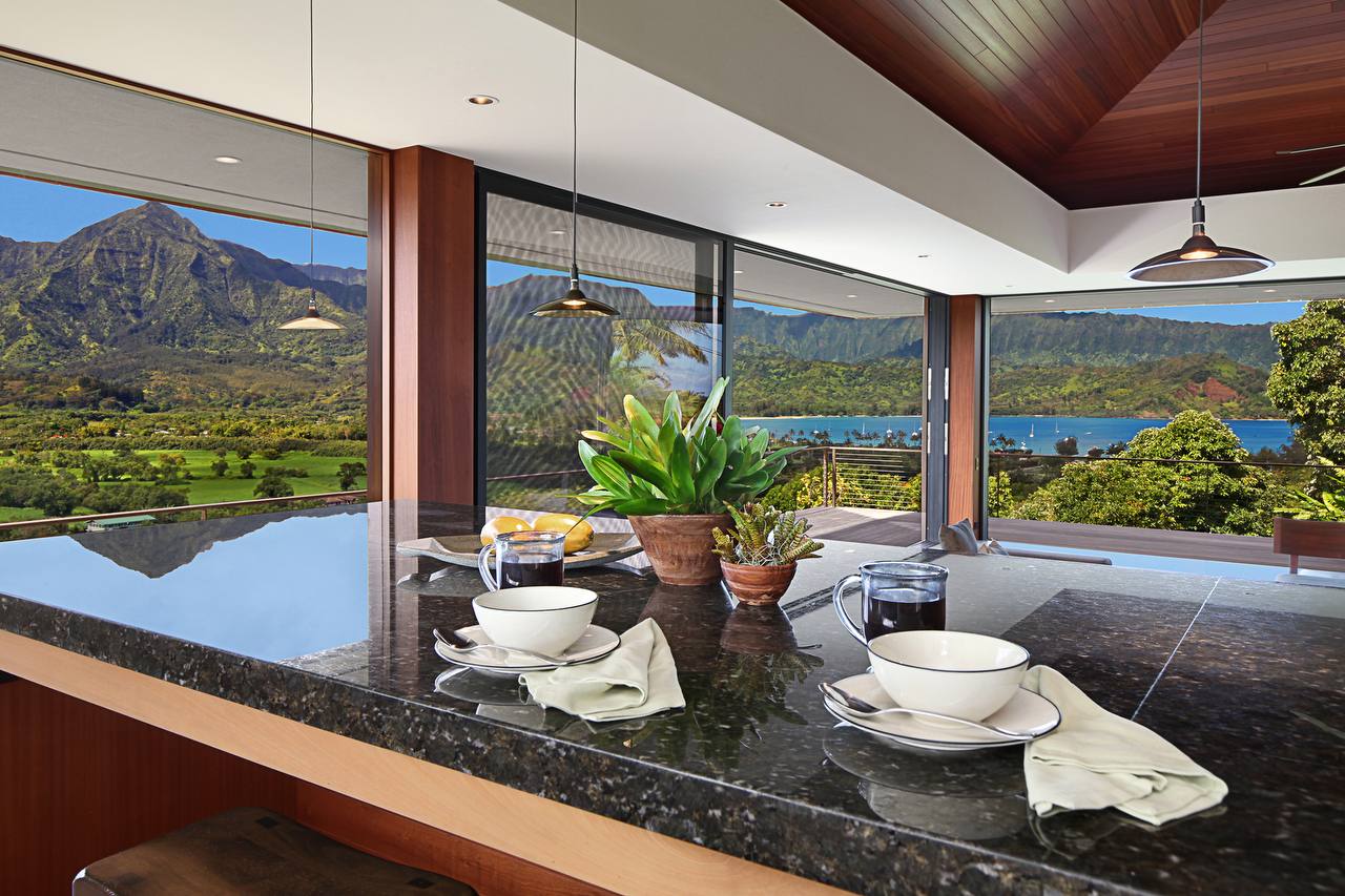 Warm residential interior on Kauaʻi showing the studio's material palette and atmosphere